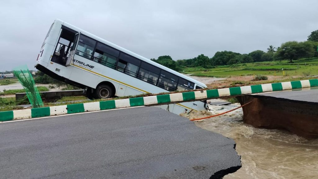 Heavy rains cause road collapse in Mahabubnagar’s Divitipally, leaving company bus stuck, 18 escape without injuries