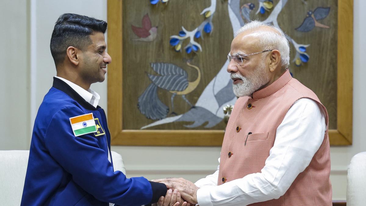 shubhanshu-shukla-meets-pm-modi;-gifts-tri-colour-that-travelled-to-space