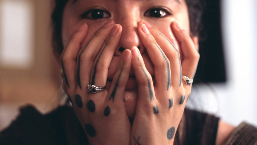 These sacred tattoos were banned in Okinawa. A new generation is bringing them back.